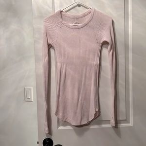 Lululemon pink sweater, great condition, has thumb holes, believe it is size 4.